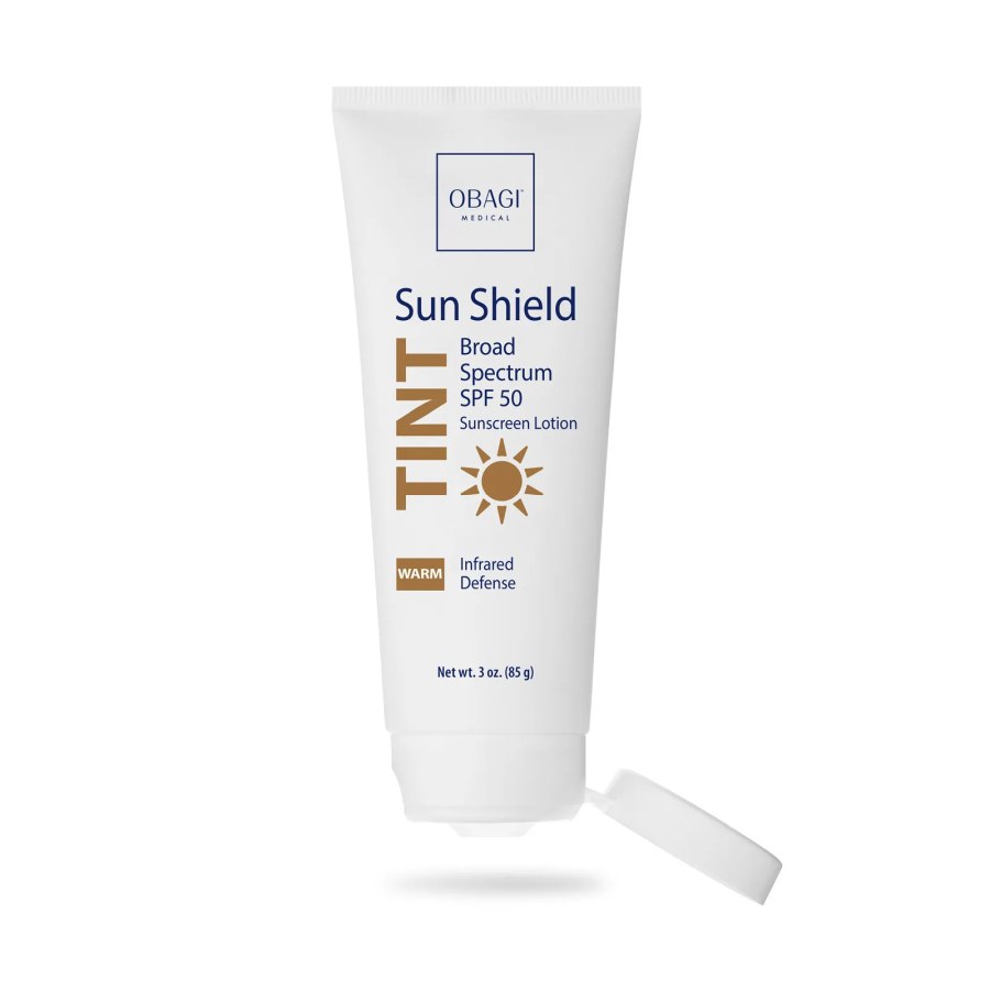Тонирующий солнцезащитный лосьон широкого спектра защиты SPF 50 с тёплым оттенком (Sun Shield Tint Broad Spectrum SPF 50 Warm )